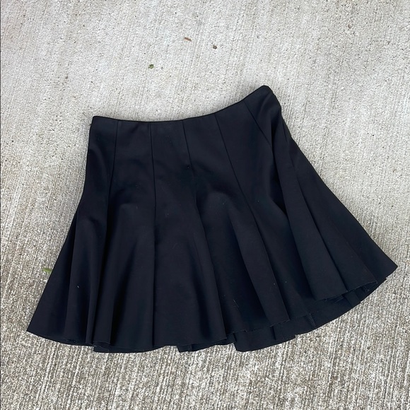 Astr Dresses & Skirts - ASTR Black Pleated Mini Skirt Sz L Neoprene Raw Hem Skater A Line Preppy Stretch